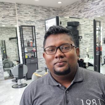 Avatar tilhørende Dinesh