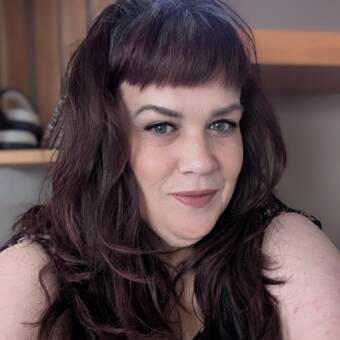 The avatar of Angela